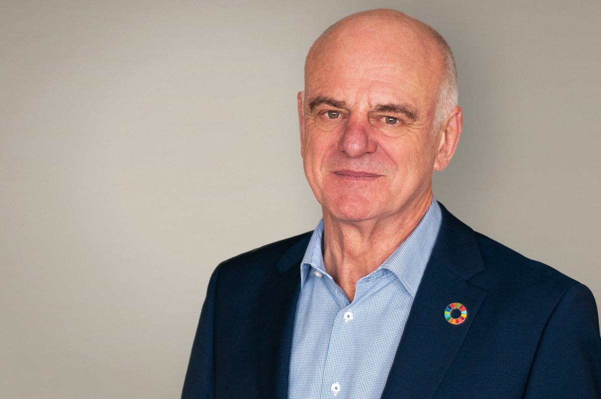 Photo of David wearing an SDG wheel pin