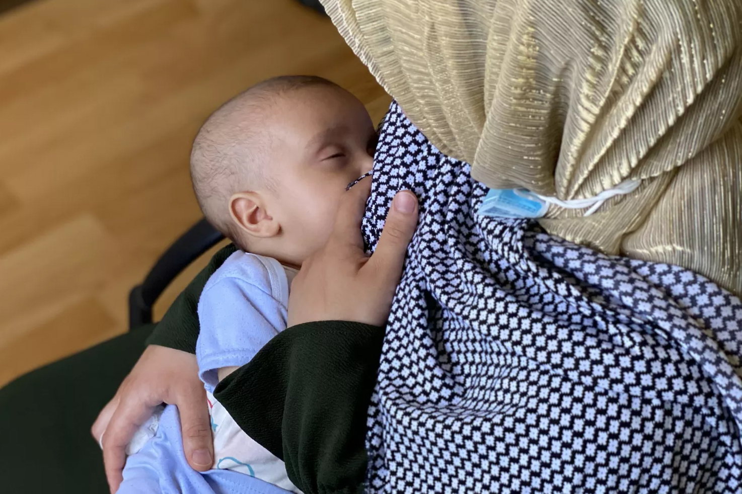mother breastfeeding baby