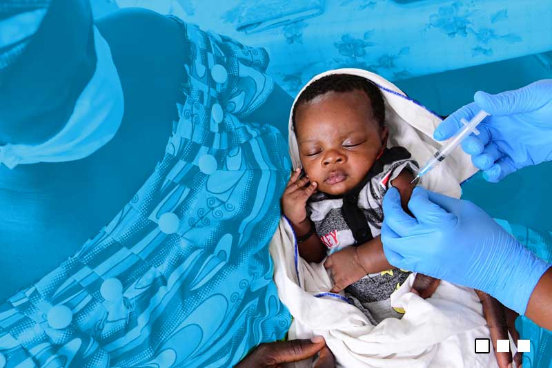 a baby receiving vaccine injection in the arm