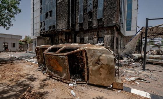 An upturned vehicle lies in front of a building in the Sudanese capital, Khartoum. (file) 