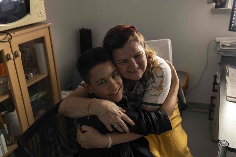 Two people hugging