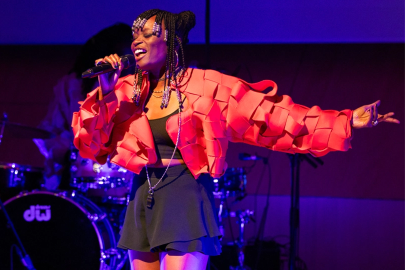 Poundo performing on stage.